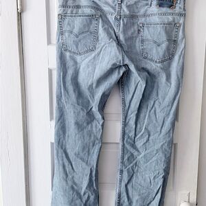 Levi's Faded Blue Denim Jeans 562 destructive 40x32